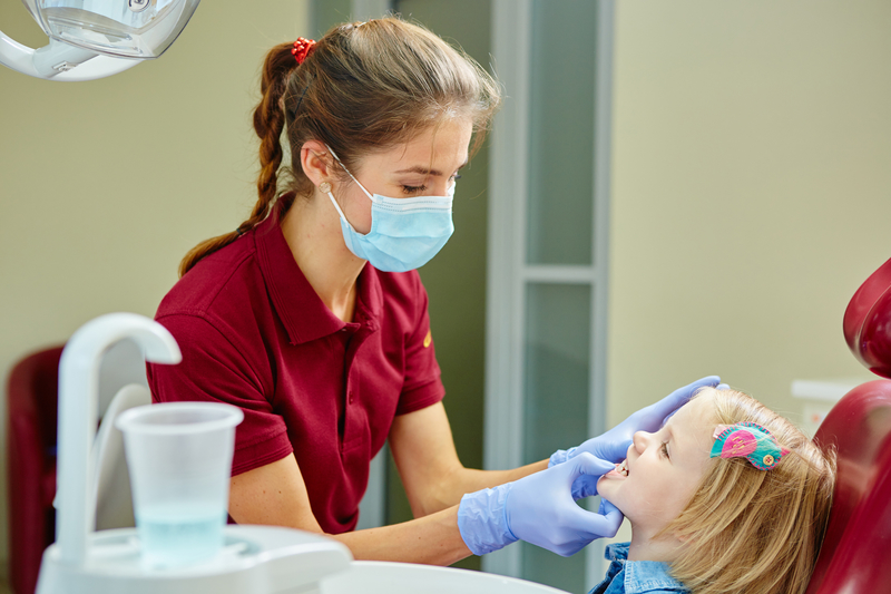 child receiving dental care at the dentist's office